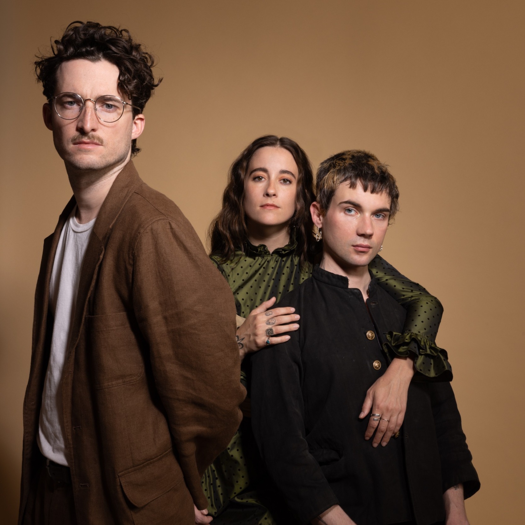3 people sitting in a cinema, red