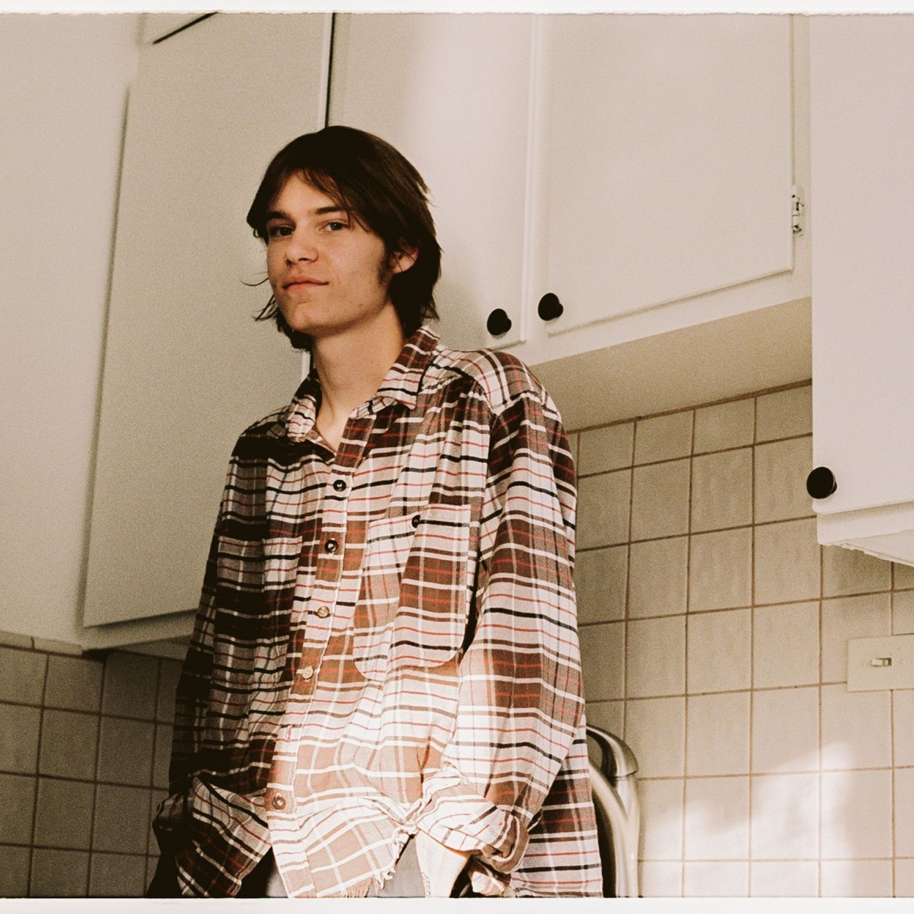 Man standing in a kitchen