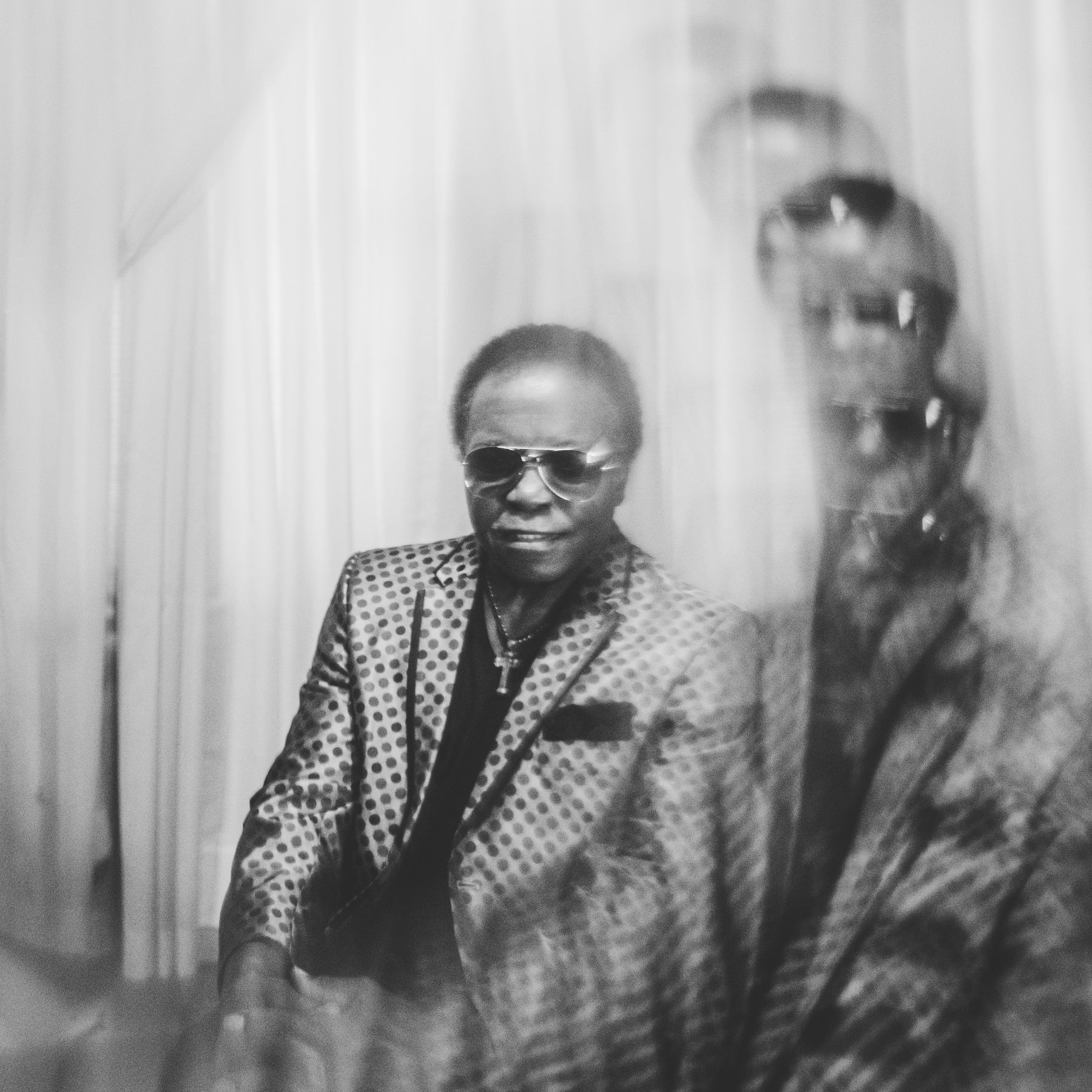 Man with blurry reflections