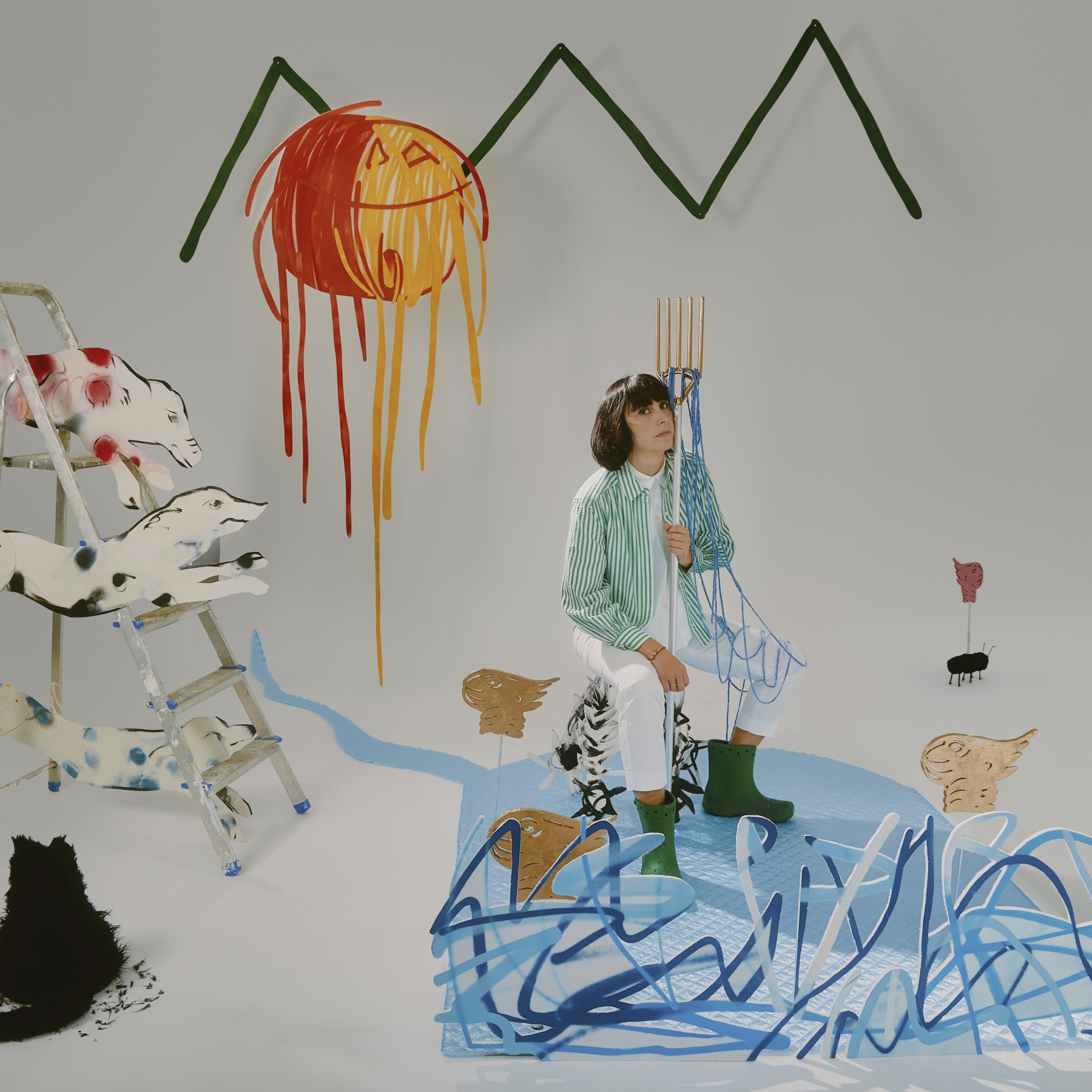 Woman in setting with art