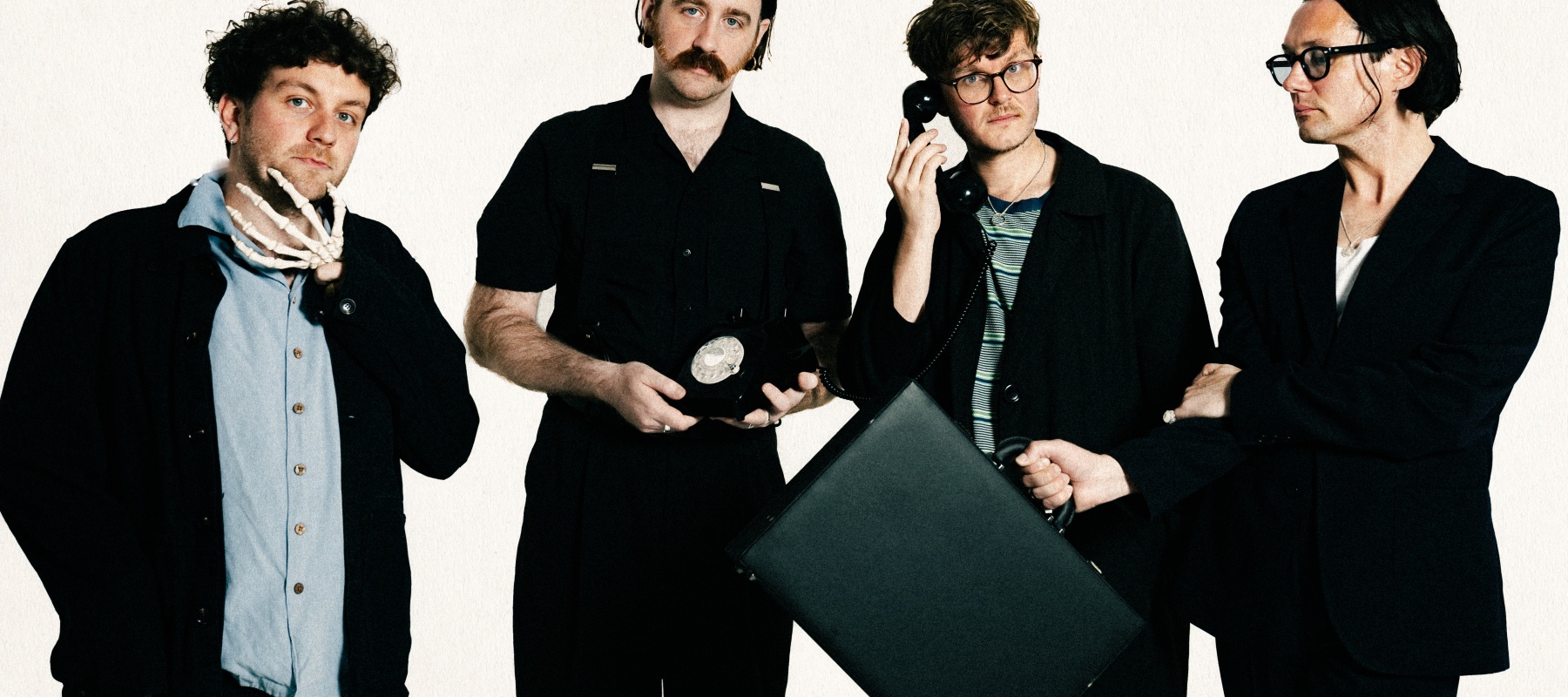 Band, 4 men standing next to eachother