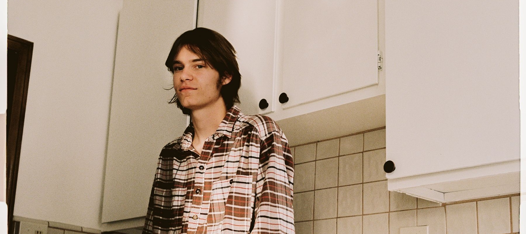 Man standing in a kitchen