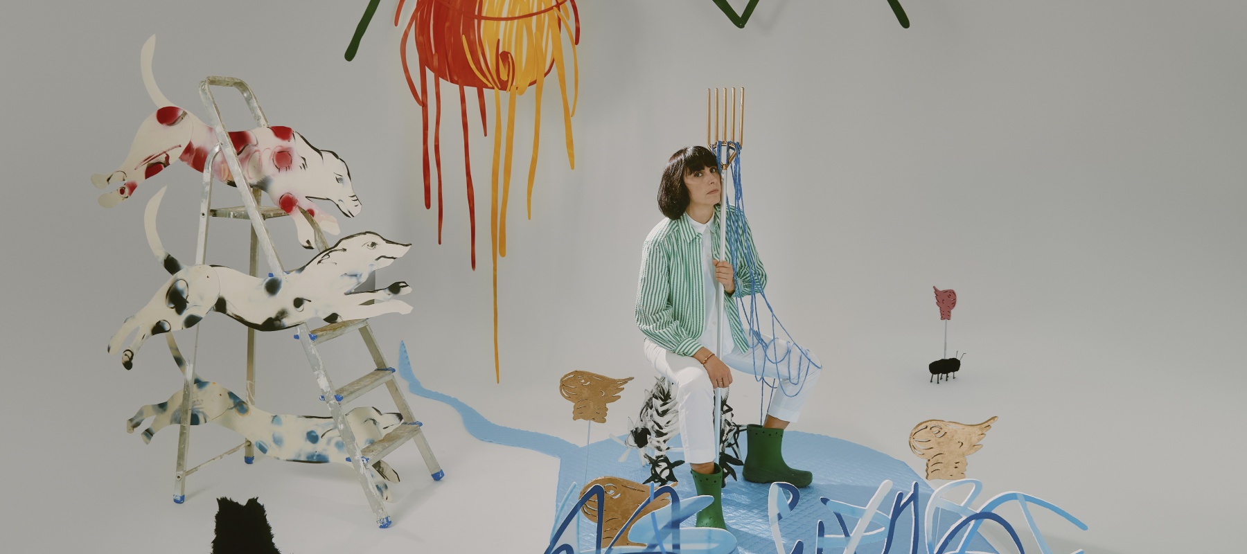 Woman in setting with art